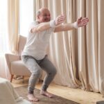 Older man working out at home 