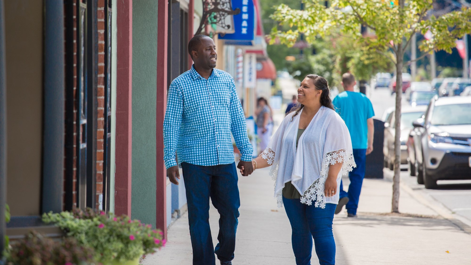 Two people hold hands as they shop downtown in Northumberland