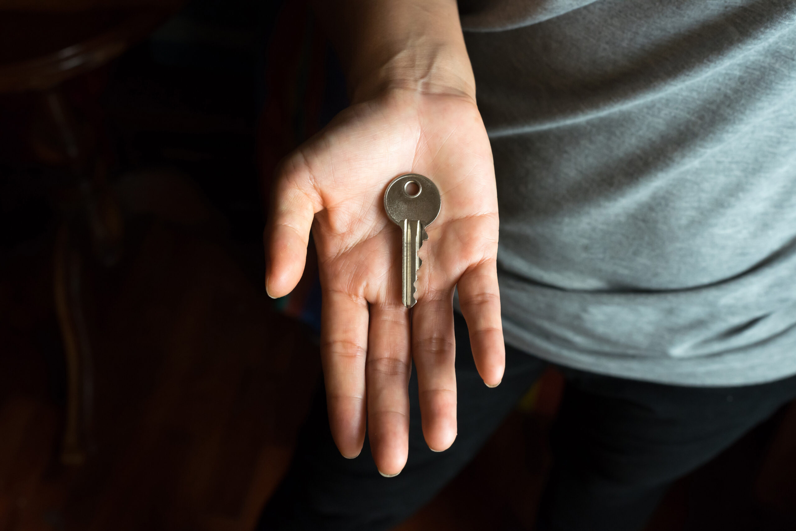 Hand holding key