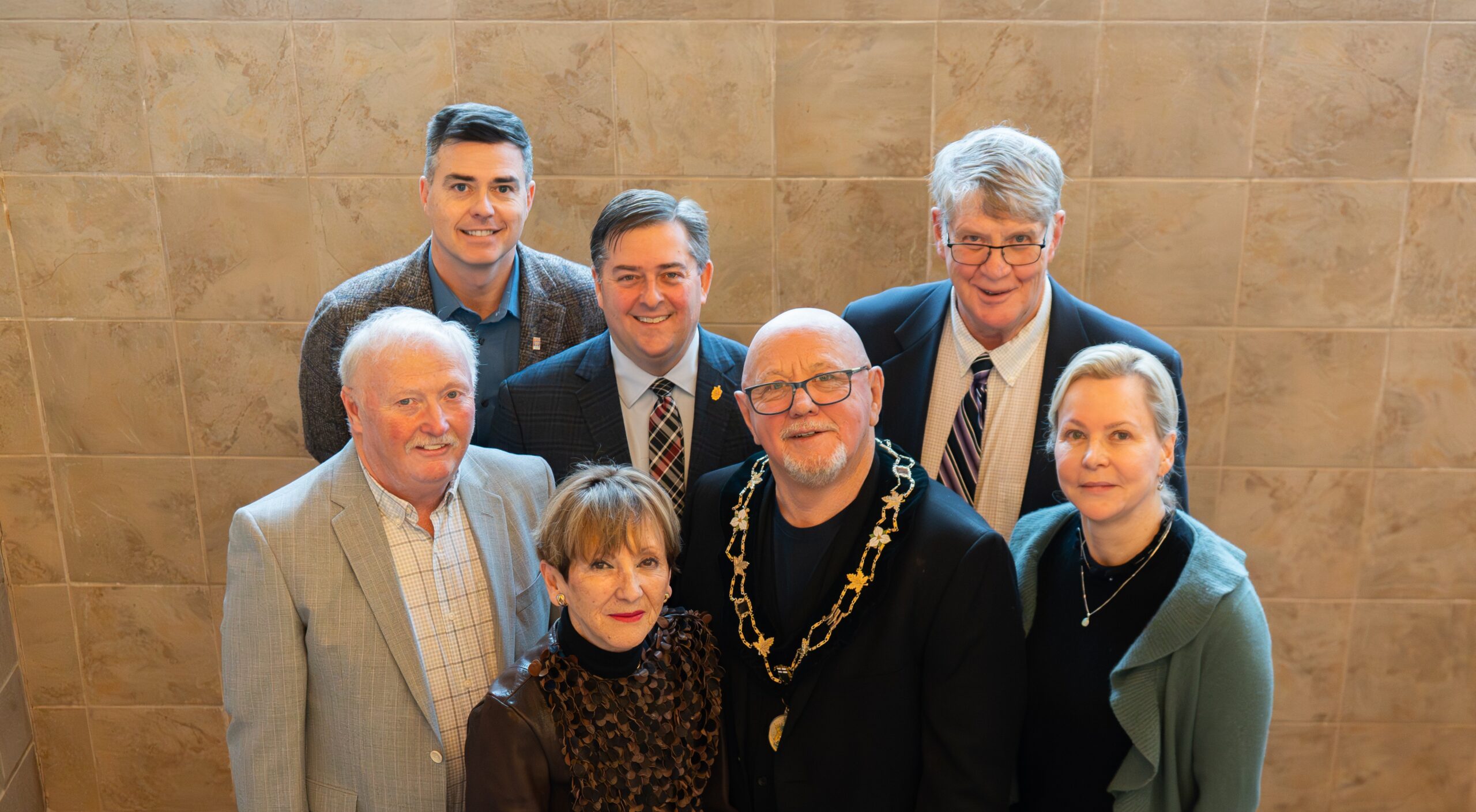 Members of Northumberland County Council standing together in County headquarters.
