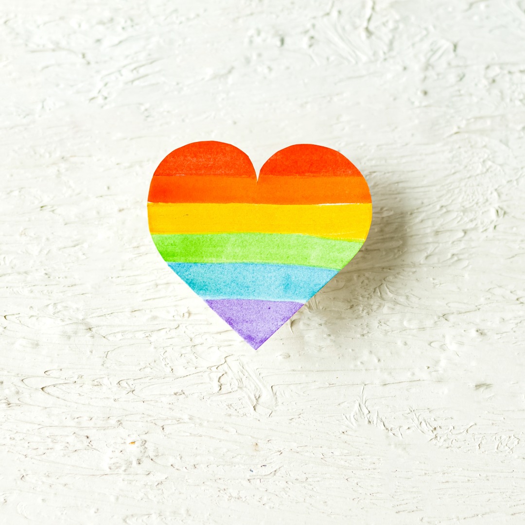 Cut out of a rainbow heart.