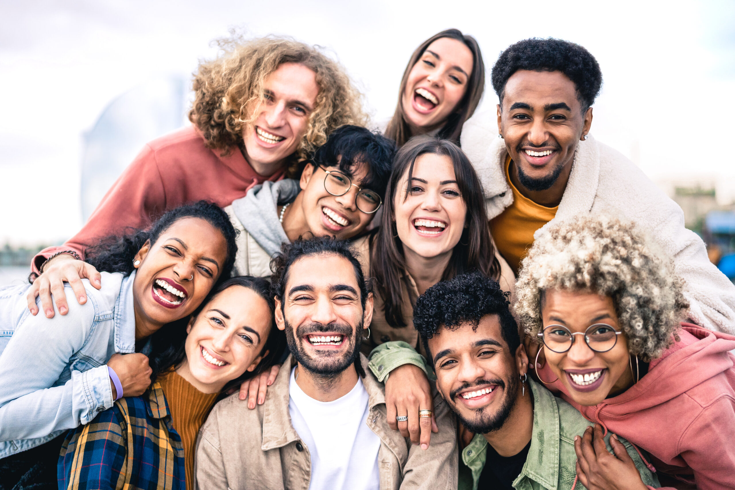 Group of diverse people smiling for the camera.