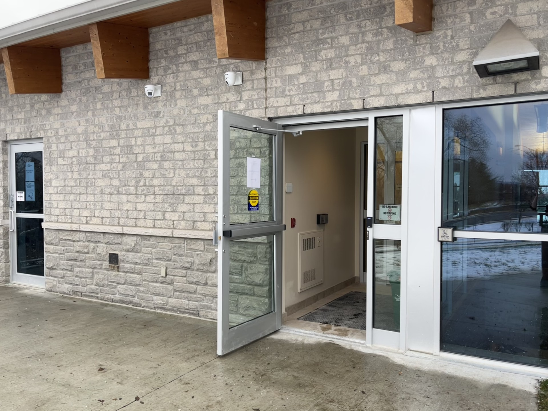 Powered doors and accessible exit at County building