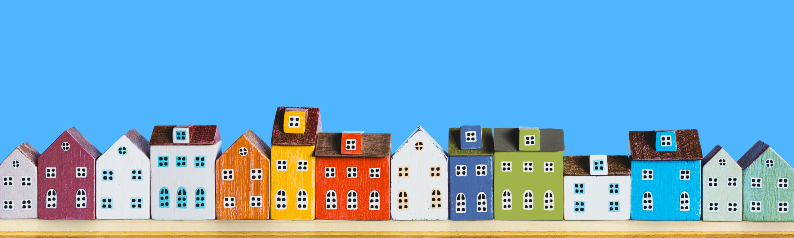 Illustration of various diverse colourful houses.