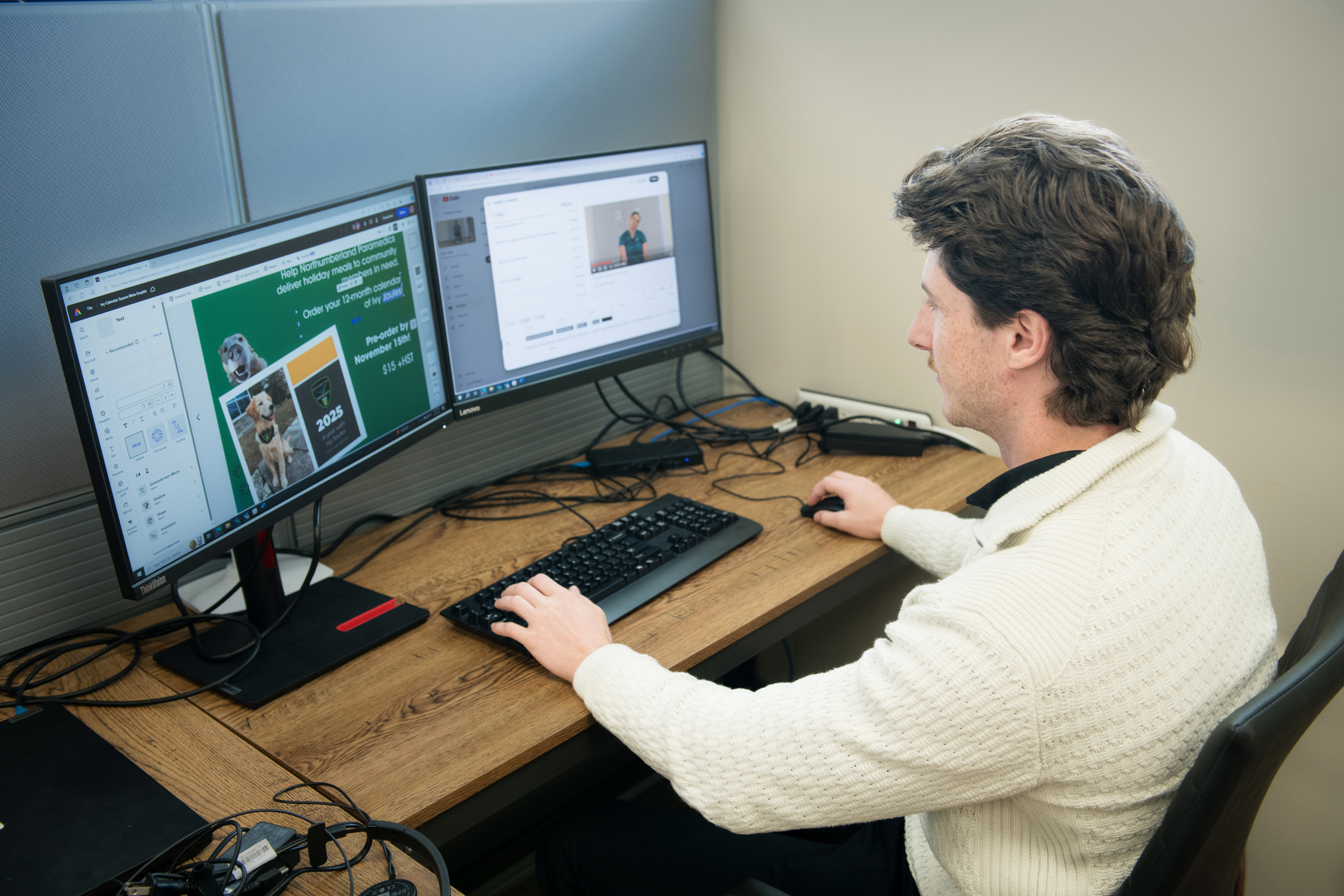 Communications Intern works on poster