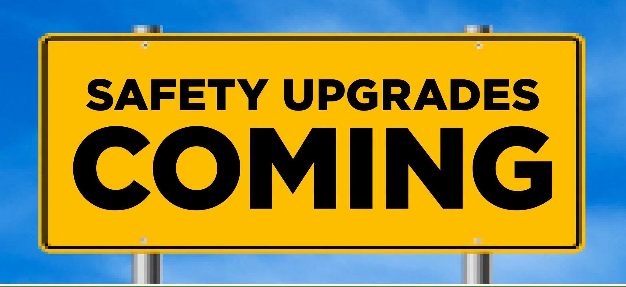 Illustration of a road sign reading "Safety Upgrades Coming Soon."