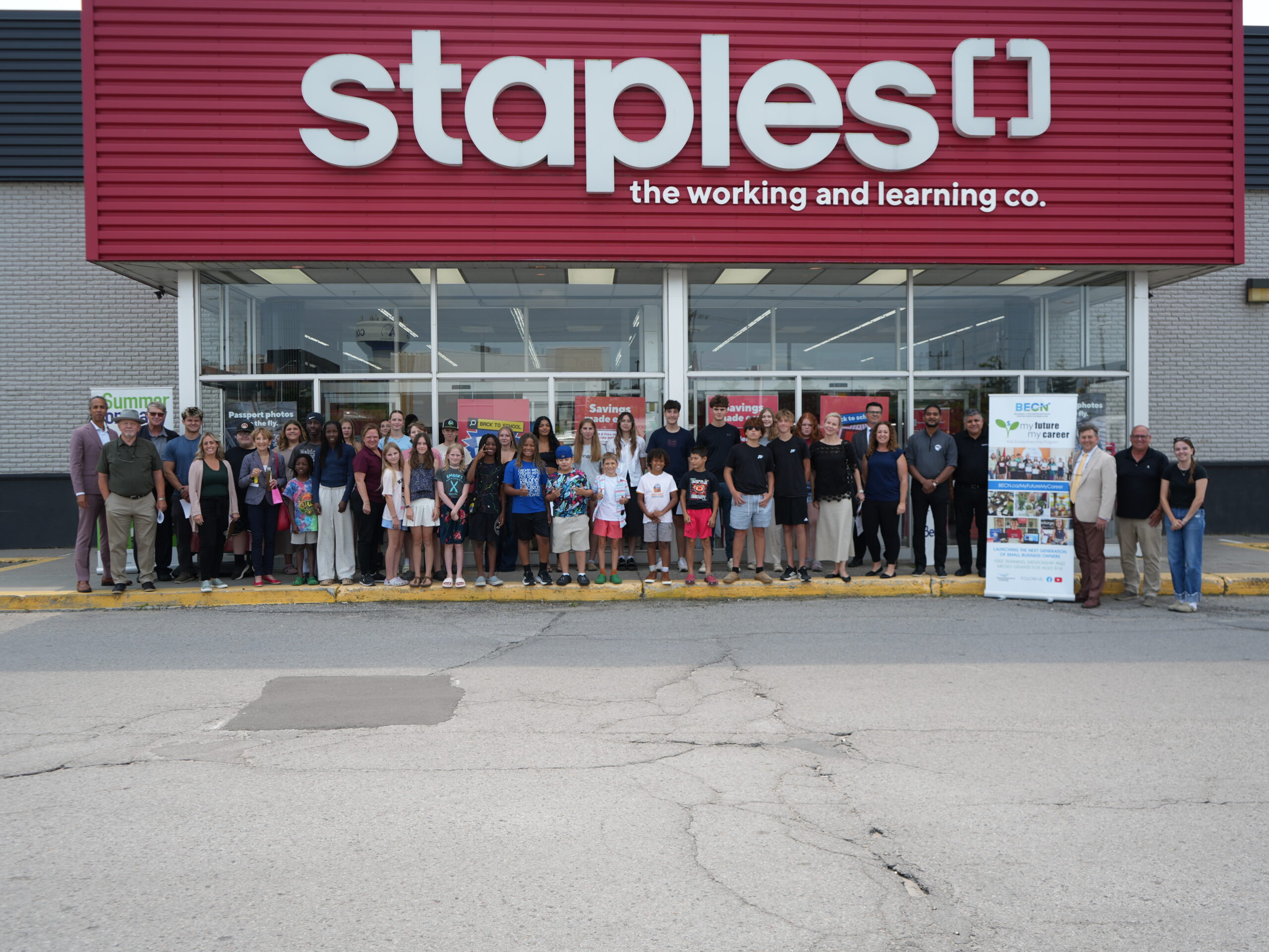 Program participants, county staff and Council along with staples Canada staff outside of the store.