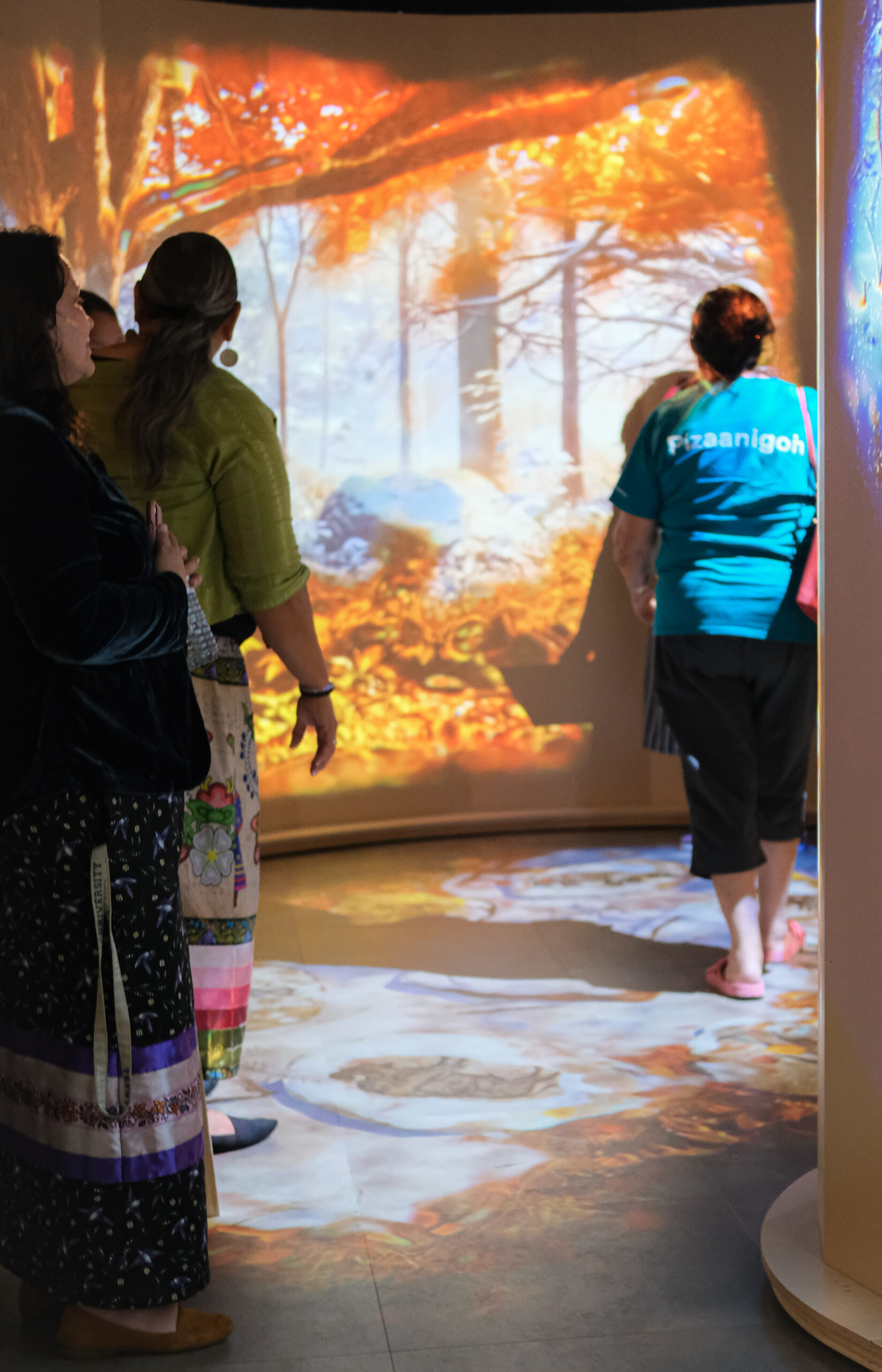 Visitors walk through the immersive exhibit at NCAM