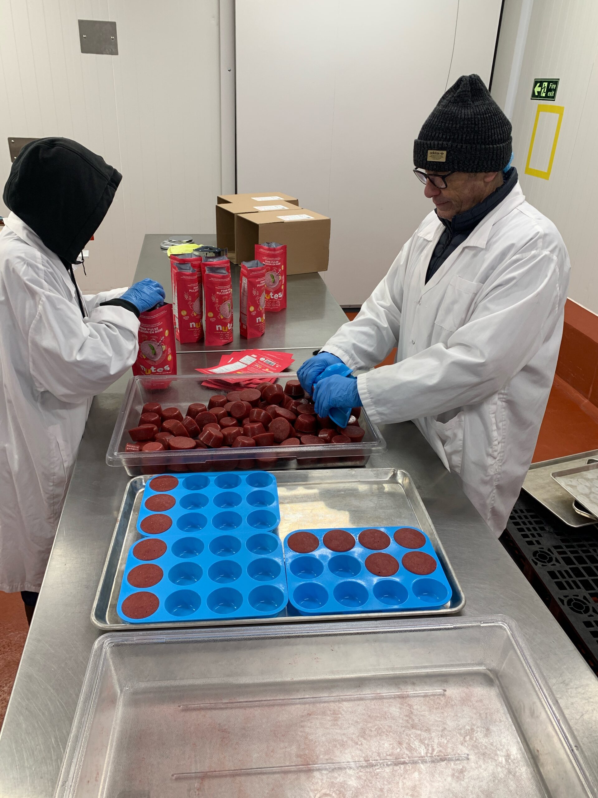 OAFVC staff pack local food product into bags